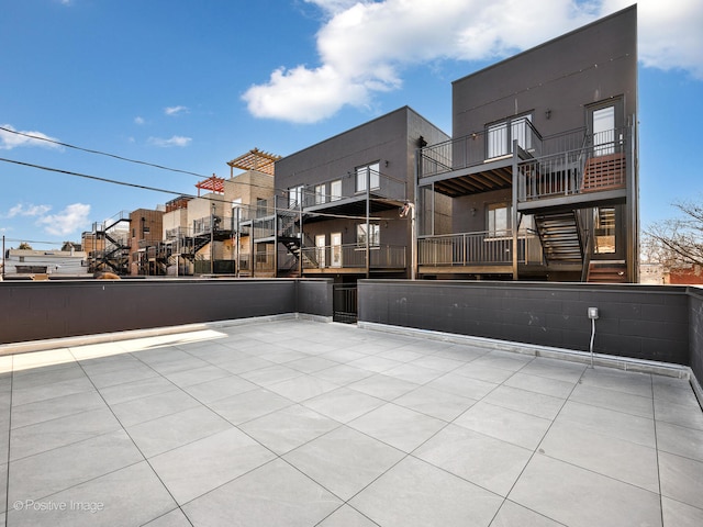 view of patio / terrace with a balcony