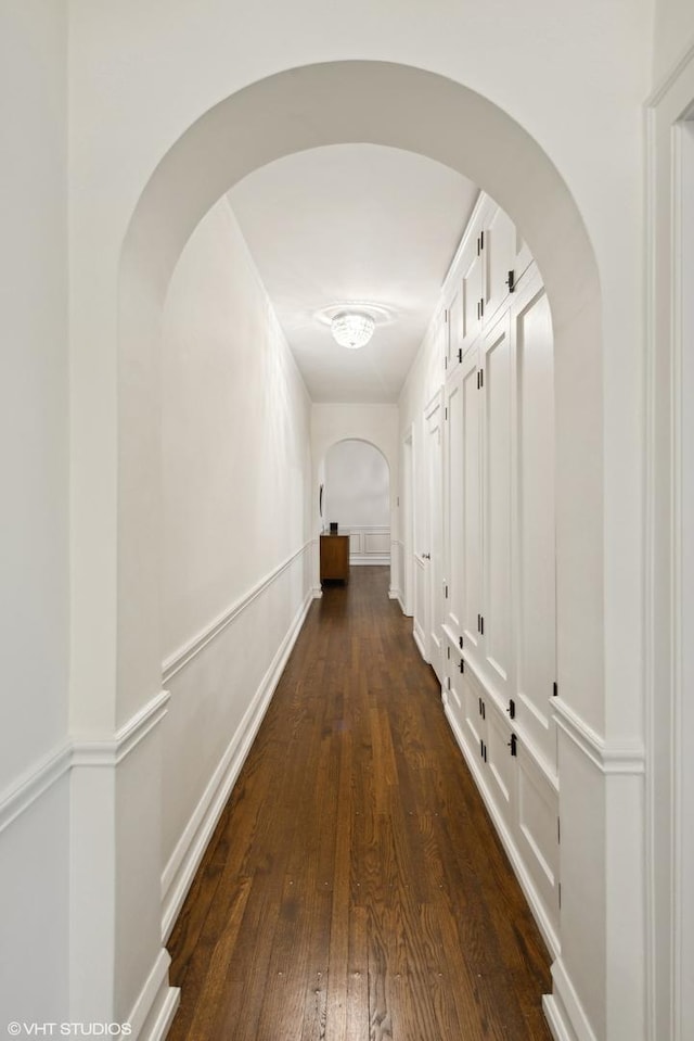 hall featuring dark wood-type flooring