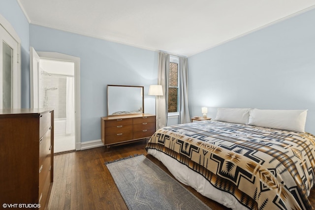 bedroom featuring dark hardwood / wood-style flooring