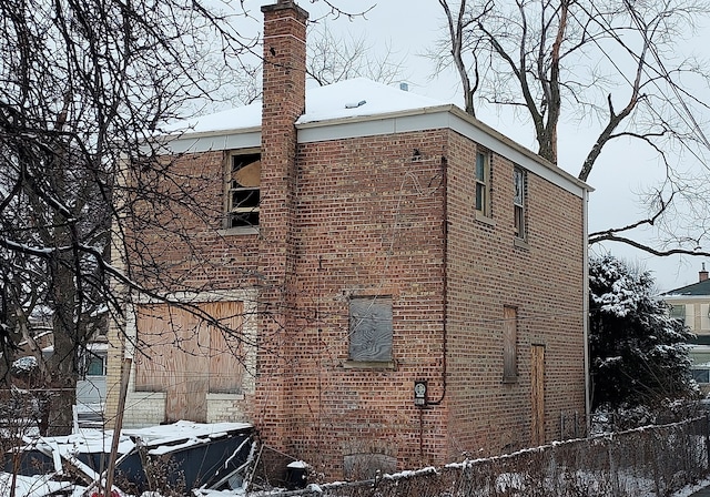 view of snow covered property