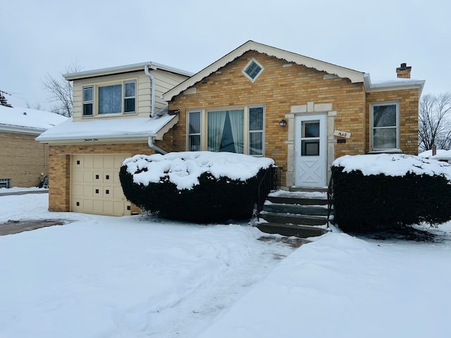 view of front of property featuring a garage