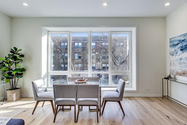 dining room featuring light hardwood / wood-style floors