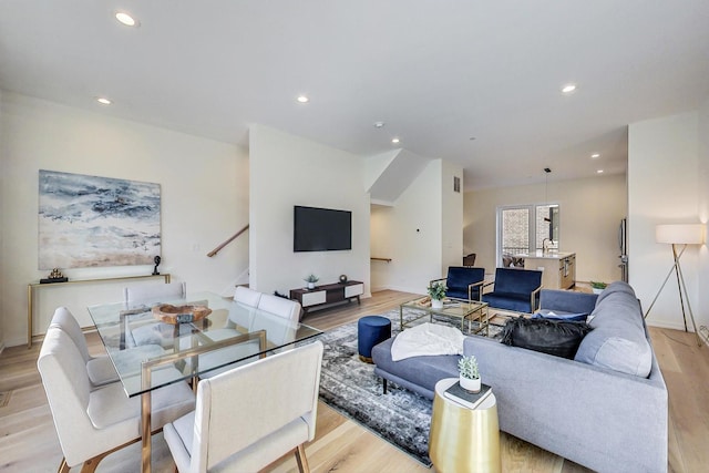 living room with light hardwood / wood-style flooring