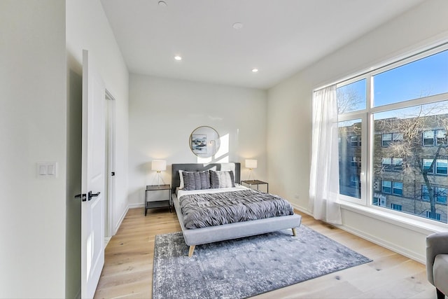 bedroom featuring light wood-type flooring