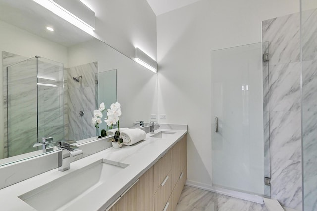 bathroom featuring tile floors, tiled shower, and double sink vanity