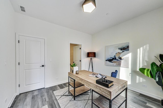 office space featuring dark hardwood / wood-style flooring