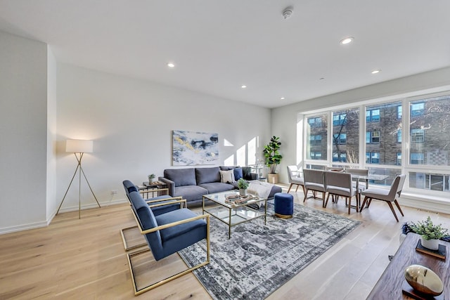 living room with light hardwood / wood-style floors