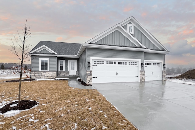 craftsman inspired home with a garage