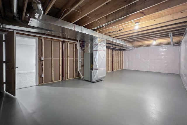 basement featuring heating utilities