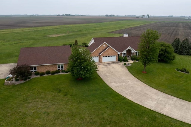 birds eye view of property featuring a rural view