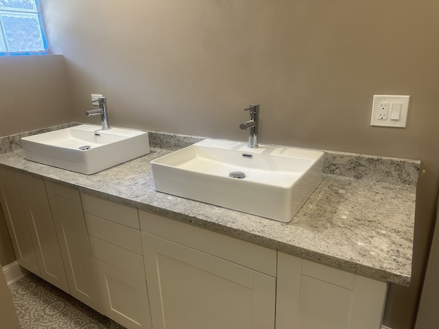 bathroom featuring double sink vanity