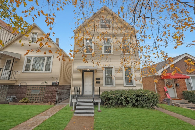 view of front facade with a front lawn