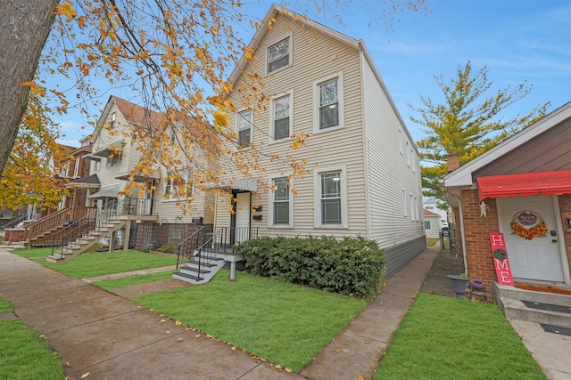 view of front of home with a front yard