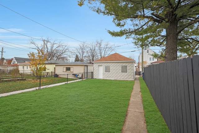 rear view of house featuring a yard