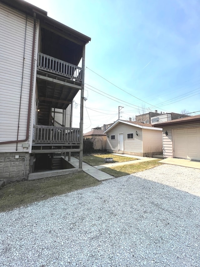 view of yard with a balcony