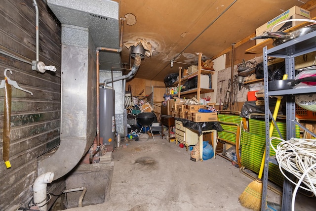 storage room featuring water heater