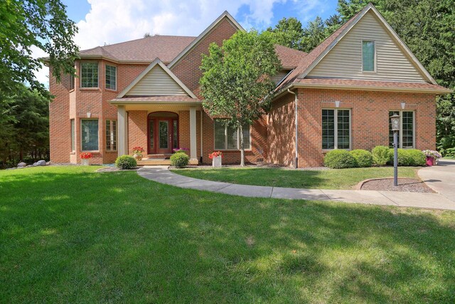 view of front of house with a front lawn