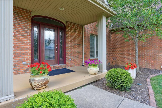 entrance to property with a porch