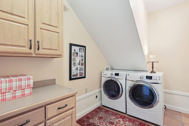 laundry room with cabinets and independent washer and dryer