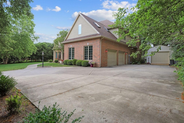 view of property exterior featuring a garage and a yard