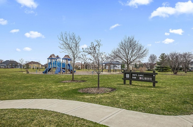 view of jungle gym featuring a gazebo and a lawn