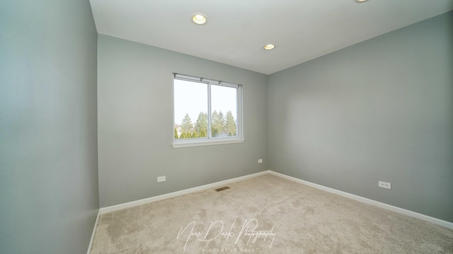 view of carpeted spare room