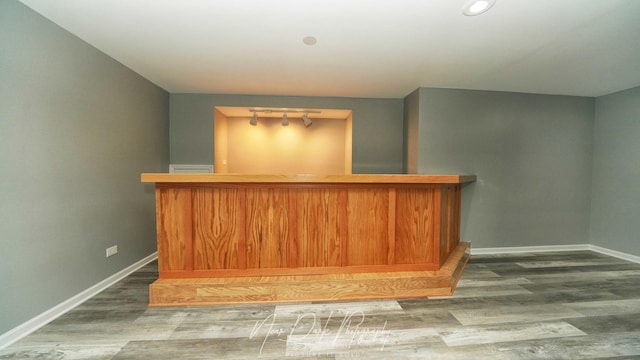 bar featuring hardwood / wood-style floors