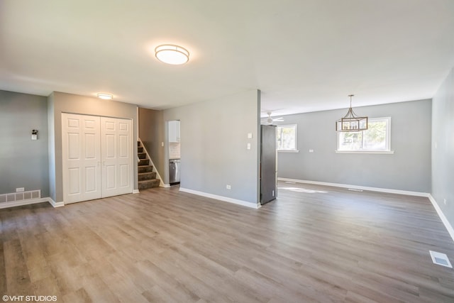 unfurnished room featuring wood-type flooring and ceiling fan