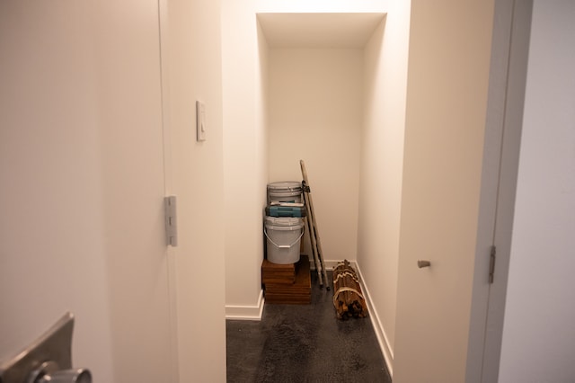 hallway with dark carpet