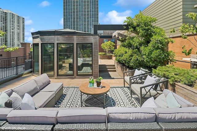 view of terrace with an outdoor living space