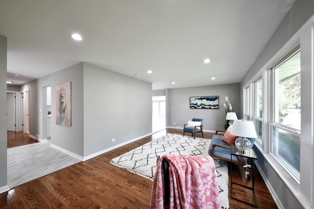 living room with dark hardwood / wood-style floors