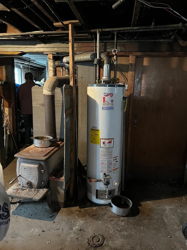 utility room with water heater