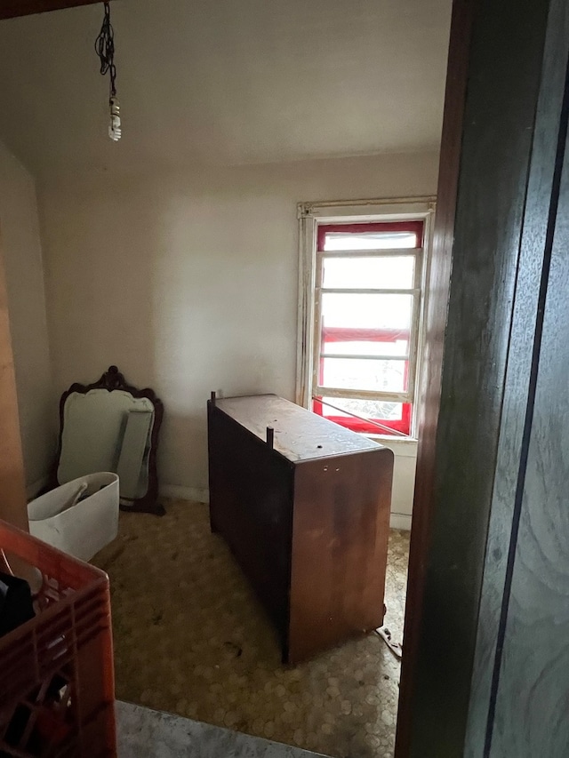 bedroom featuring dark carpet