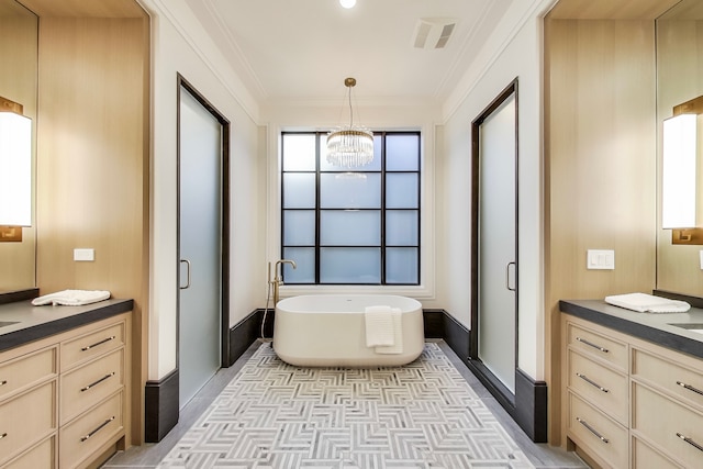 bathroom featuring tile floors, shower with separate bathtub, a chandelier, vanity with extensive cabinet space, and ornamental molding