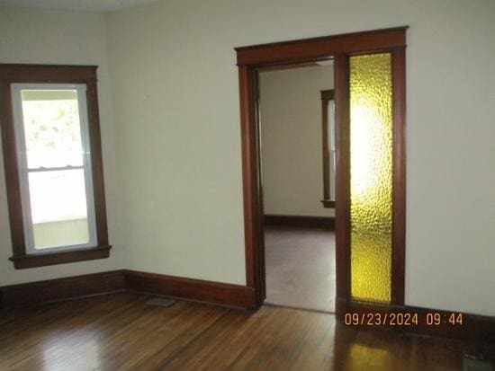 empty room featuring hardwood / wood-style floors