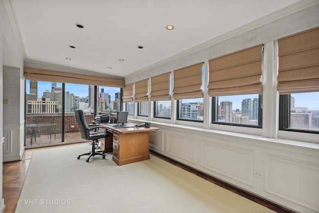 home office featuring light parquet floors and ornamental molding