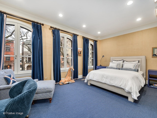 bedroom with carpet flooring, crown molding, and multiple windows