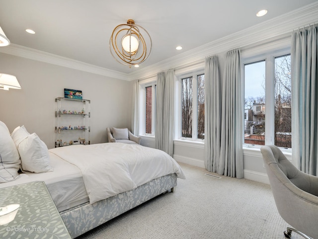 bedroom featuring carpet floors and crown molding