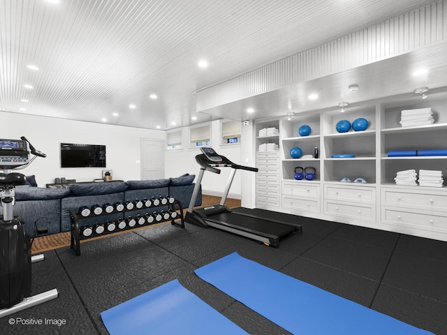 workout room with built in shelves