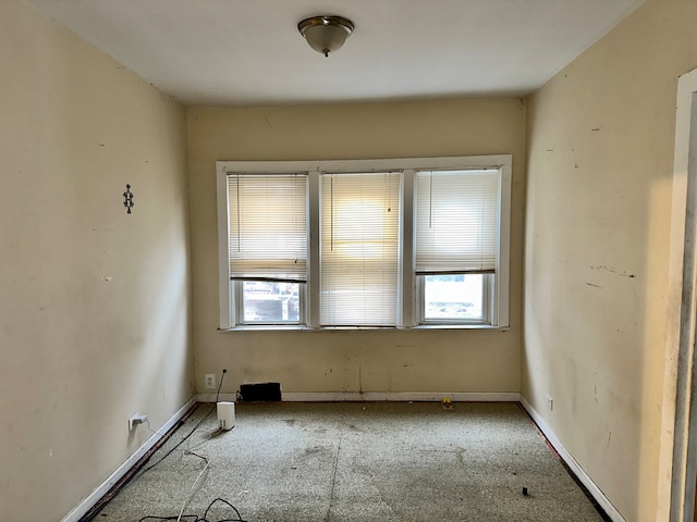 view of carpeted spare room