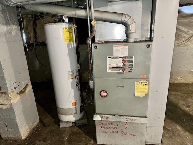 utility room with water heater