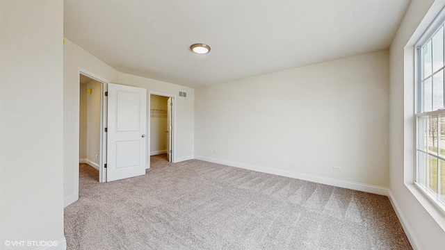 bathroom with baseboards, toilet, and vanity
