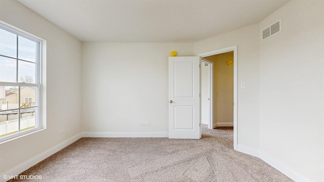 unfinished basement featuring heating unit, stairs, and electric panel