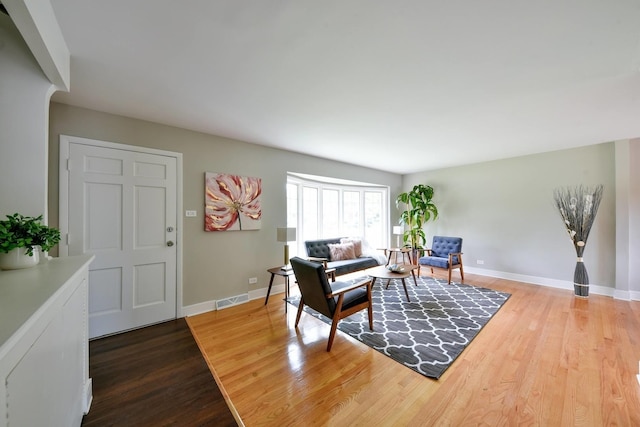 dining space featuring light wood-type flooring