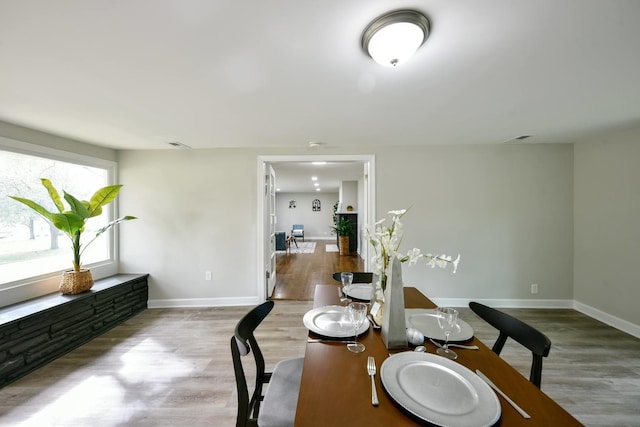 dining area featuring light hardwood / wood-style floors