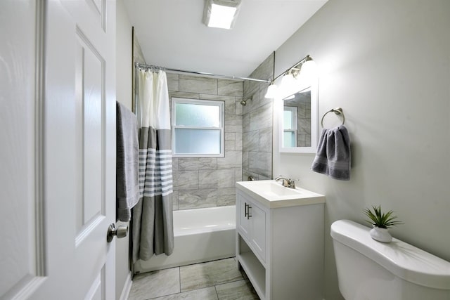 full bathroom featuring toilet, shower / tub combo with curtain, tile floors, and vanity