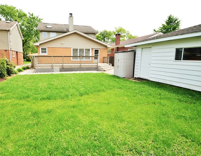 view of yard featuring a deck