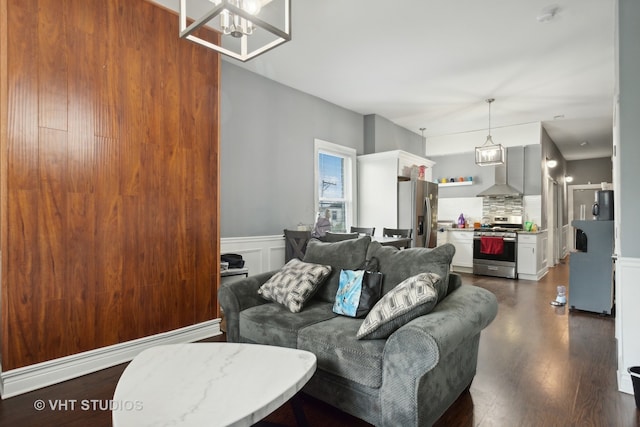 living room with dark hardwood / wood-style flooring