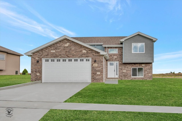 view of front of house with a front yard and a garage