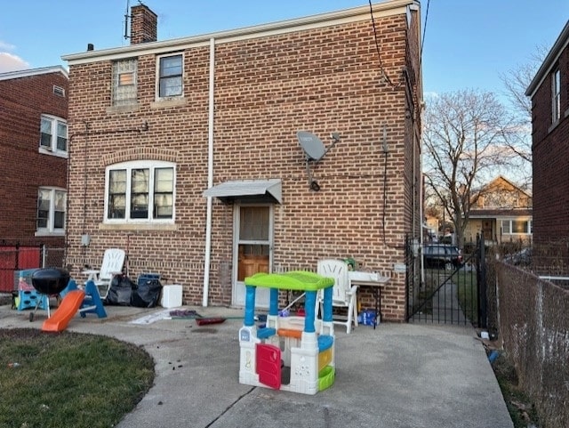 back of house featuring a patio